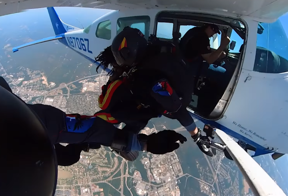 Fort Bragg's Bowley Elementary School Principal Latonya Leeks and retired Master Sgt. Sunnydale Hyde, with All Veteran Group, make a tandem jump on Friday, May 12, 2023. The duo jumped from a 1969 Cessna P206 owned by Troy Gammon of Raeford. Leeks told her students if they read enough books she'd jump from a plane. The students exceeded the goal.