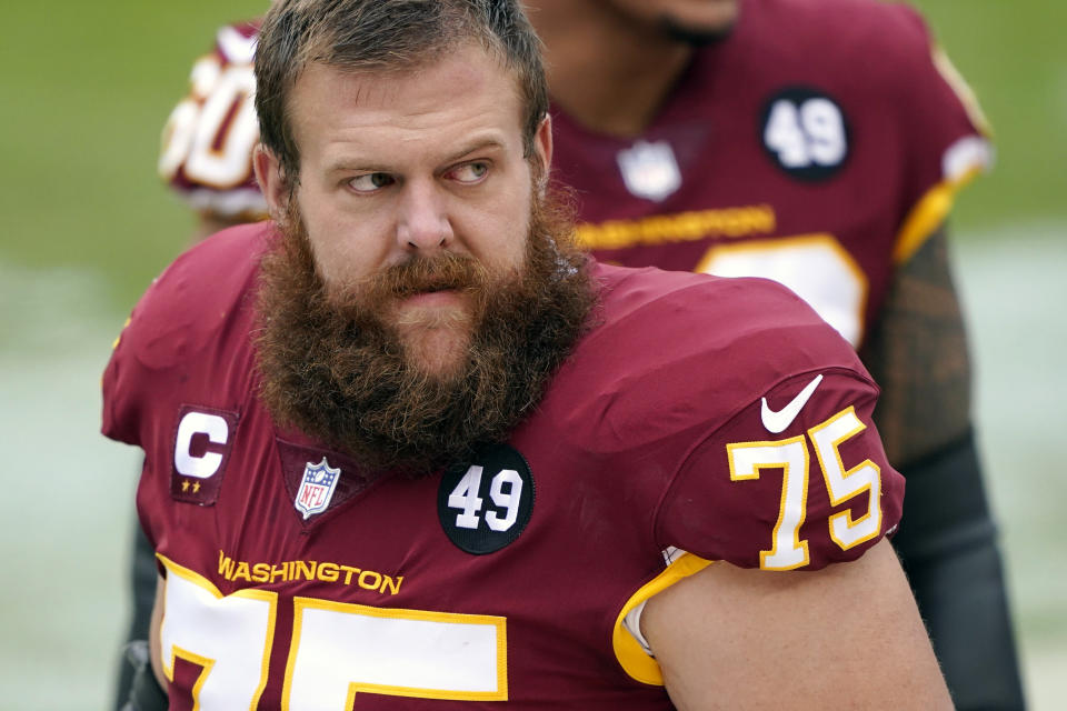 FILE - In this Sunday, Dec. 20, 2020, file photo, Washington Football Team offensive guard Brandon Scherff stands on the sideline prior to an NFL football game between the Seattle Seahawks and the Washington Football Team, in Landover, Md. On Monday, March 8, 2021, Washington announced they've placed the franchise tag on guard Brandon Scherff for a second consecutive year. Scherff is coming off his first All-Pro season. (AP Photo/Mark Tenally, File)