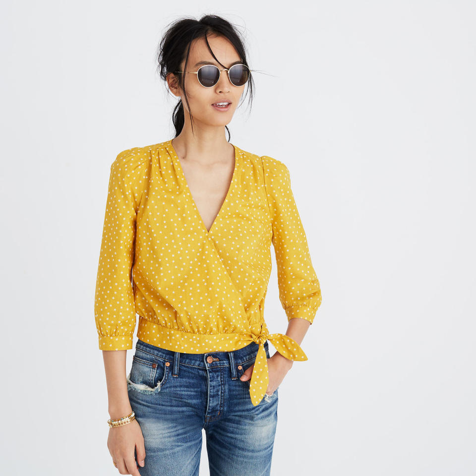 Get it <a href="https://www.madewell.com/madewell_category/SHIRTSTOPS/topsblouses/PRD~G7804/G7804.jsp?Nbrd=M&amp;Nloc=en_US&amp;Nrpp=48&amp;Npge=1&amp;Ntrm=wrap+top&amp;isSaleItem=false&amp;color_name=STARS%20ANT.%20CORAL&amp;isFromSearch=true&amp;isNewSearch=true&amp;hash=row0" target="_blank">here</a>.&nbsp;