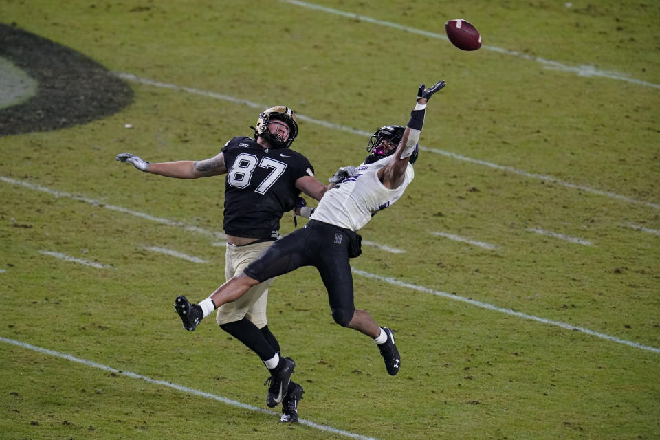 Northwestern CB Greg Newsome II, right, made several eye-opening plays in coverage in 2020. (AP Photo/Michael Conroy)