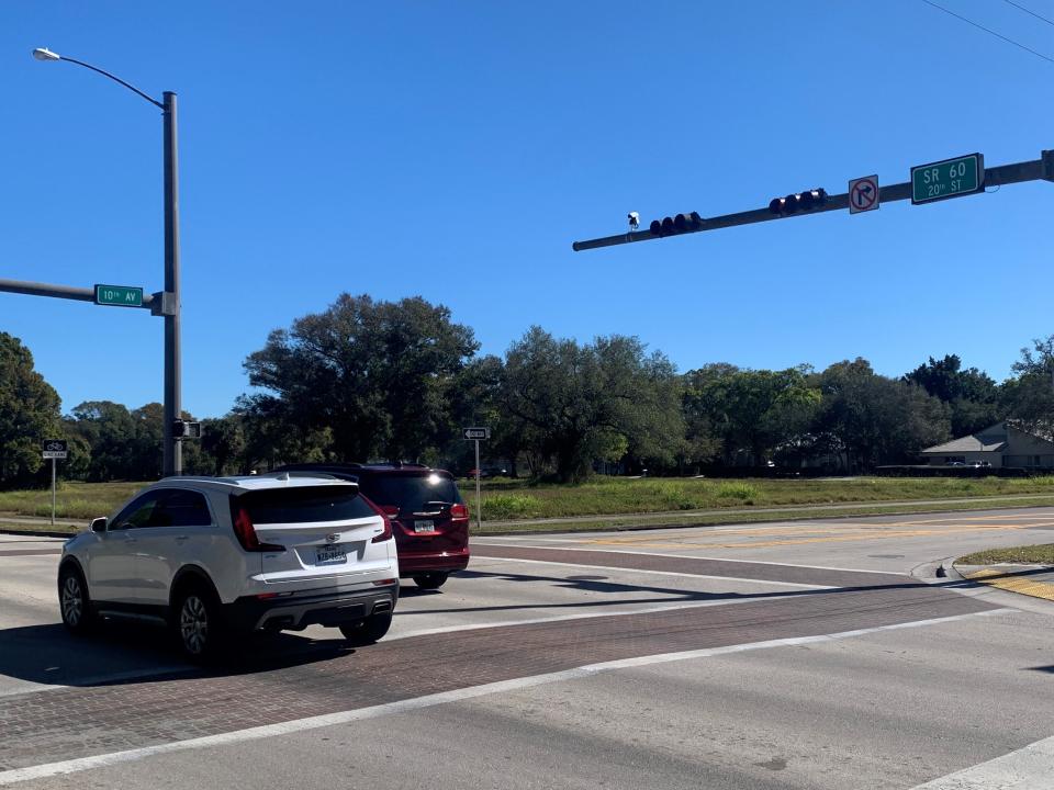 Traffic heads east through the intersection of 20th Street and 10th Avenue in Vero Beach Jan. 31, 2022. The empty block to the southeast was sold in November 2021 for $2.35 million and is slated for a storage facility.