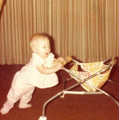 Hollie Marie is just at 6 months-old in this photo that was taken months before her parents' murder.