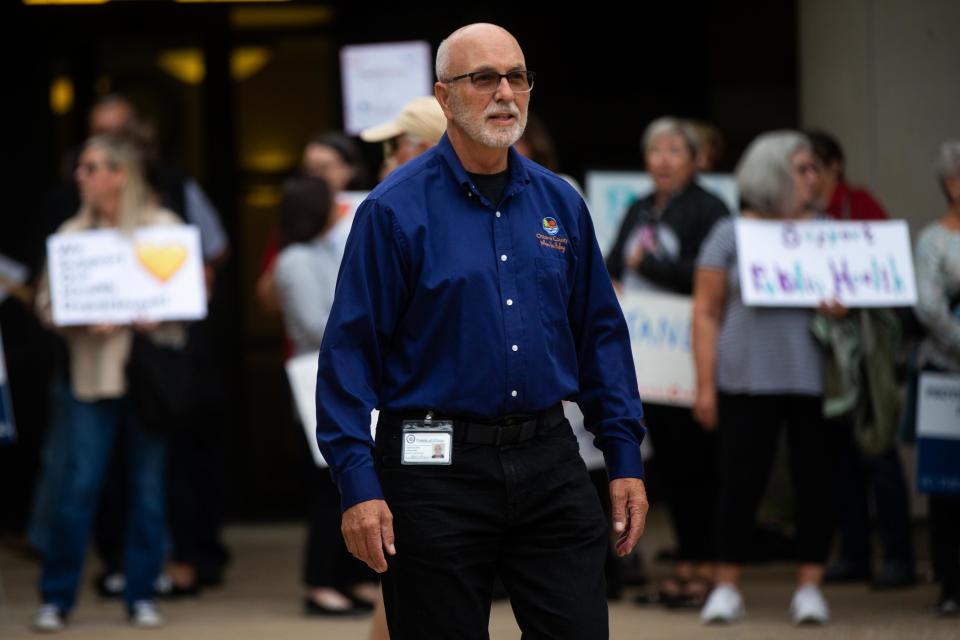 Commissioner Roger Bergman greets members of the public ahead of a meeting Tuesday, Sept. 26, 2023, in West Olive.