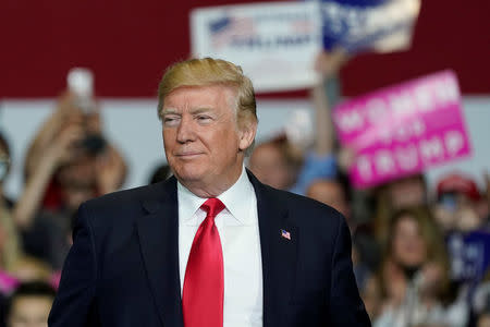 U.S. President Donald Trump arrives to speak at a Make America Great Again Rally in Washington, Michigan April 28, 2018. REUTERS/Joshua Roberts