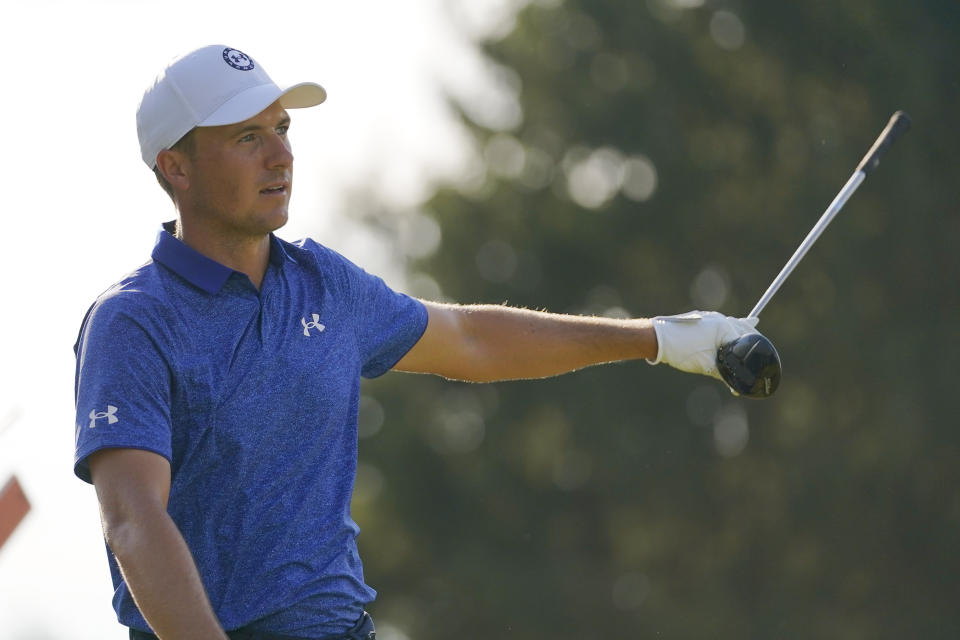 Jordan Spieth points to the direction of his shot off the 16th tee during the second round of the BMW Championship golf tournament at Wilmington Country Club, Friday, Aug. 19, 2022, in Wilmington, Del. (AP Photo/Julio Cortez)