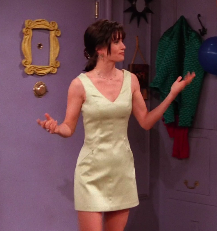 Monica wearing a short dress