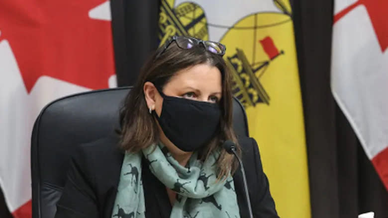 Dr. Jennifer Russell, the chief medical officer of health, addresses reporters during a news conference in Fredericton Thursday afternoon. (Government of New Brunswick)