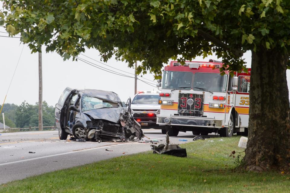 A heavily damaged minivan is seen at the scene where a man was heavily entrapped inside a minivan after a crash on Route 30, Friday, Aug. 2, 2024, in Berwick Township.