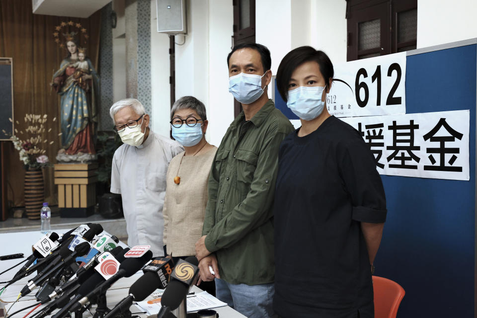 From left, Retired archbishop of Hong Kong Cardinal Joseph Zen, barrister Margaret Ng, professor Hui Po-keung and singer Denise Ho attend a press conference to announce the closure of the 612 Humanitarian Relief Fund, in Hong Kong, Aug.18, 2021. Reports say a Roman Catholic cardinal and three others have been arrested in Hong Kong on suspicion of colluding with foreign forces to endanger Chinese national security. U.K.-based human rights group Hong Kong Watch said Cardinal Joseph Zen, lawyer Margaret Ng, singer Denise Ho and scholar Hui Po-keung were detained Wednesday, May 11, 2022 by Hong Kong's National Security Police. (HK01 via AP)