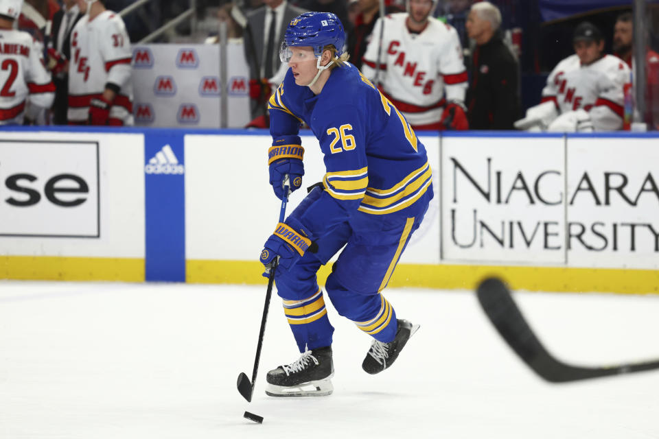 Buffalo Sabres defenseman Rasmus Dahlin (26) carries the puck upice during the second period of an NHL hockey game against the Carolina Hurricanes, Sunday, Feb. 25, 2024, in Buffalo, N.Y. (AP Photo/Jeffrey T. Barnes)