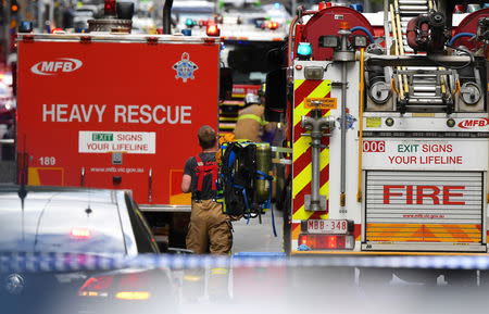 Emergency rescue personnel can be seen near the Bourke Street mall in central Melbourne, Australia, November 9, 2018. AAP/James Ross/via REUTERS