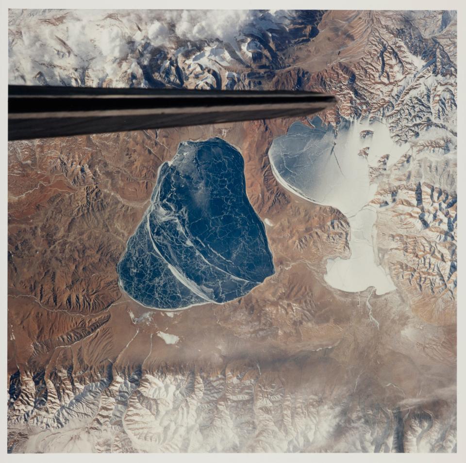 Satellite imagery showing twin lakes on the Tibetan Plateau north of the country's border with Nepal, Tibet, January 1992.
