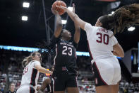South Carolina guard Bree Hall (23) shoots over Stanford guard Haley Jones (30) during the first half of an NCAA college basketball game in Stanford, Calif., Sunday, Nov. 20, 2022. (AP Photo/Godofredo A. Vásquez)