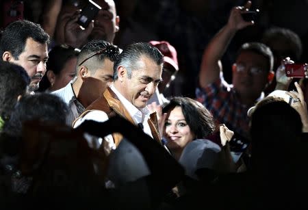 Jaime Rodriguez (C), independent candidate for governor of Nuevo Leon state, is greeted by supporters during his closing campaign rally in Monterrey, May 31, 2015. REUTERS/Stringer