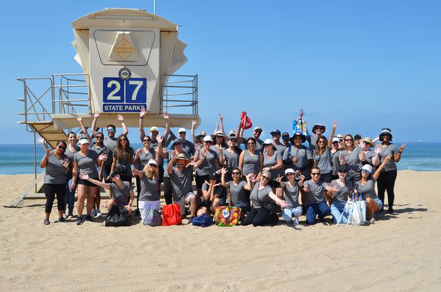 <p>Tri Pointe Homes</p> Tri Pointe Homes associates at a beach cleanup event at Bolsa Chica State Beach in Huntington Beach, Calif., on Aug. 8.