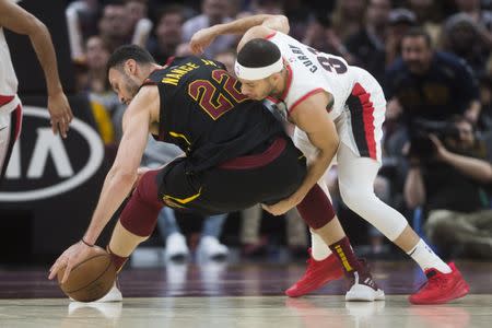 Feb 25, 2019; Cleveland, OH, USA; Cleveland Cavaliers forward Larry Nance Jr. (22) and Portland Trail Blazers guard Rodney Hood (5) go for a loose ball during the second half at Quicken Loans Arena. Mandatory Credit: Ken Blaze-USA TODAY Sports