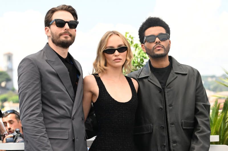 Left to right, director Sam Levinson poses with singer/actor Abel "The Weeknd" Tesfaye and actress Lily-Rose Depp for "The Idol" at the 76th Cannes Film Festival at Palais des Festivals in Cannes, France on May 23, 2023. File Photo by Rune Hellestad/ UPI