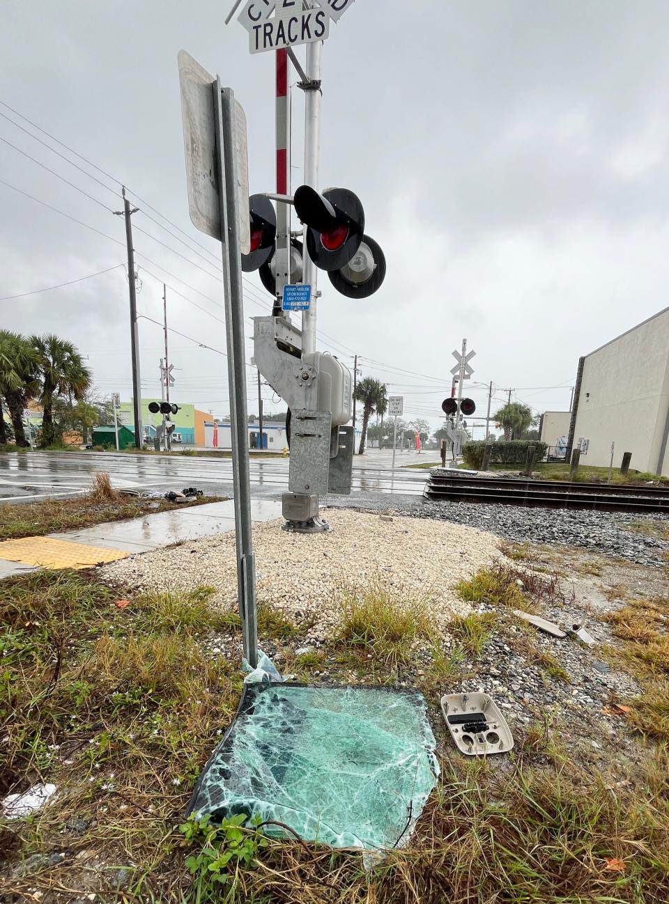 Vehicle debris from previous collisions at WH Jackson Street railroad crossing in Melbourne.