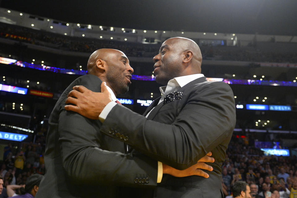 Former Lakers stars Magic Johnson and Jerry West shared emotional messages after Kobe Bryant was killed in a helicopter crash on Sunday.