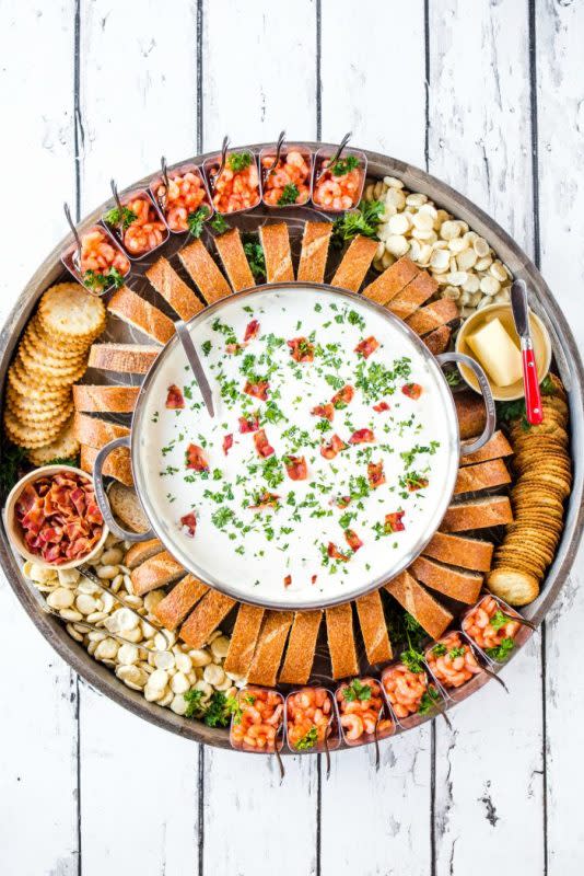 <p>The Reluctant Entertainer</p><p>Make a big pot of clam chowder for this epic clam chowder dinner board. Serve with shrimp cocktail, bread and your favorite crackers.</p><p><strong>Get the recipe: </strong><a href="https://reluctantentertainer.com/epic-clam-chowder-dinner-board/" rel="nofollow noopener" target="_blank" data-ylk="slk:Epic Clam Chowder Dinner Board;elm:context_link;itc:0;sec:content-canvas" class="link rapid-noclick-resp"><strong>Epic Clam Chowder Dinner Board</strong></a></p>