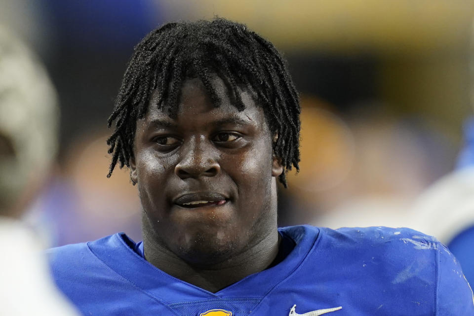 Pittsburgh defensive lineman Calijah Kancey stands on the sideline during an NCAA college football game against North Carolina, Nov. 11, 2021, in Pittsburgh. Kancey, a finalist for the Bronko Nagurski Award given to the top defensive player in the country, is the latest in a long line of Pitt defensive linemen who have carved a path to the NFL, a list that includes Los Angeles Rams star Aaron Donald. (AP Photo/Keith Srakocic, file)