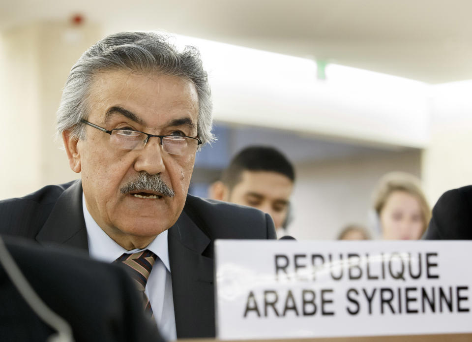 Faysal Khabbaz Hamoui, Ambassador of the Permanent Representative Mission of Syria to Geneva, delivers his speech during a session of the Human Rights Council on the report of the Commission of Inquiry on Human Rights in Syria at the European headquarters of the United Nations in Geneva, Switzerland, Tuesday, March 18, 2014. (AP Photo/Keystone, Salvatore Di Nolfi)