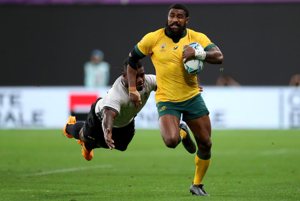 Marika Koroibete of Australia runs with the ball during the Rugby World Cup 2019 Group D game between Australia and Fiji at Sapporo Dome on September 21, 2019 in Sapporo, Hokkaido, Japan. (Photo by Dan Mullan/Getty Images)