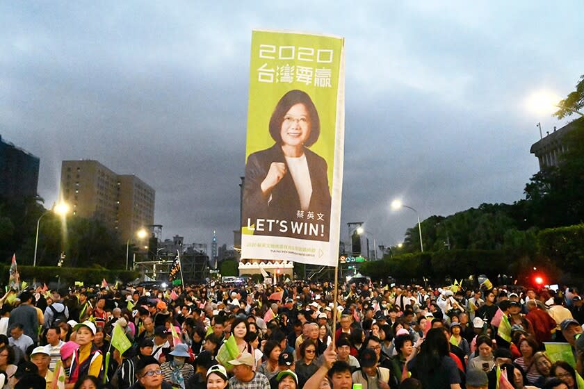Supporters of Taiwan's independence-leaning President Tsai Ing-wen hold a rally a rally in Taipei on Friday.