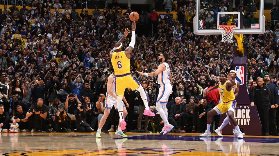 James fades away to make NBA history. - Andrew D. Bernstein/NBAE via Getty Images