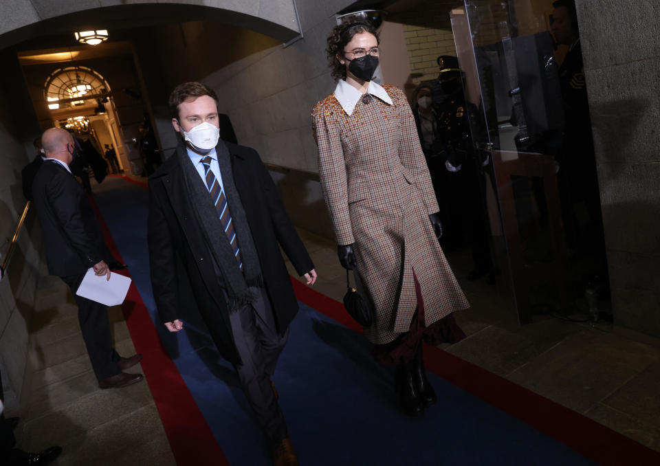 Cole Emhoff (L) and Ella Emhoff, the stepchildren of Vice President-Elect Kamala Harris arrive for the inauguration of U.S. President-elect Joe Biden on the West Front of the U.S. Capitol on January 20, 2021 in Washington, DC.  / Credit: Win McNamee / Getty Images