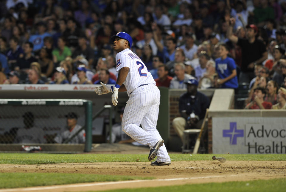 CHICAGO, IL - JUNE 16: Luis Valbuena #24 of the Chicago Cubs hits a three-run homer in the seventh inning against the Boston Red Sox on June 16, 2012 at Wrigley Field in Chicago, Illinois. (Photo by David Banks/Getty Images)