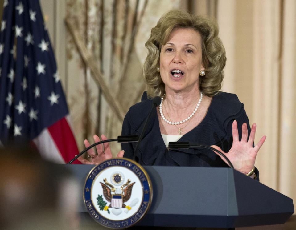 FILE - In this April 25, 2014, file photo, Dr. Deborah Birx, speaks after being sworn-in as the new ambassador-at-large and coordinator of the U.S. government activities to combat HIV/AIDS, in the Benjamin Franklin Room of the State Department in Washington. Birx was brought into President Donald Trump’s orbit to help fight the coronavirus, she had a sterling reputation as a globally recognized AIDS researcher and a rare Obama administration holdover. Less than 10 months later, her reputation is frayed and her future in President-elect Joe Biden's administration uncertain. (AP Photo/Manuel Balce Ceneta, File)