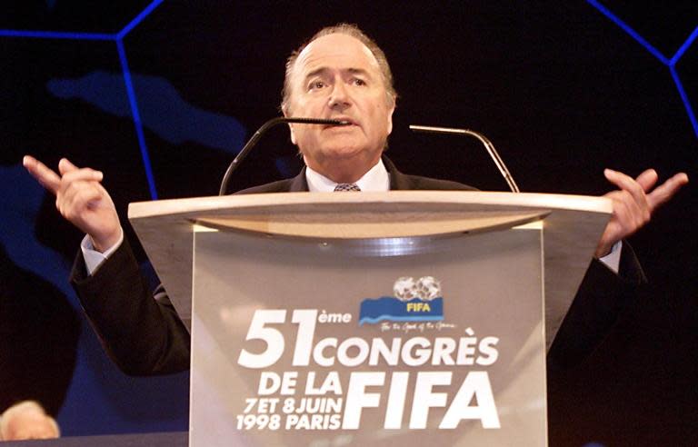 Sepp Blatter addresses delegates during the 51st FIFA congress in Paris, on June 8, 1998, shortly before being elected as the new president of the int'l football's governing body