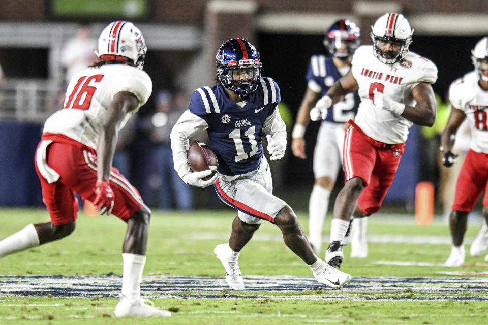 Mississippi wide receiver Dontario Drummond (11) runs after catching a pass against Austin Peay during an NCAA college football game in Oxford, Miss., Saturday, Sept. 11, 2021. (AP Photo/Bruce Newman)