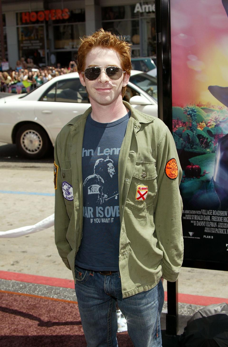 Seth Green in sunglasses and a green jacket