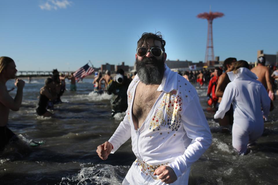 New Yorkers perform polar bear plunge at Coney Island