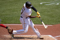 Pittsburgh Pirates' Ke'Bryan Hayes singles off St. Louis Cardinals starting pitcher Miles Mikolas during the fifth inning of a baseball game in Pittsburgh, Sunday, June 4, 2023. (AP Photo/Gene J. Puskar)