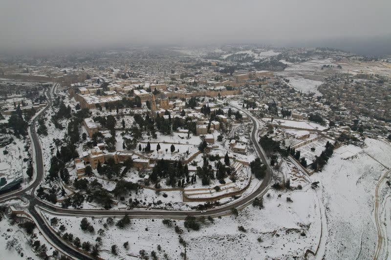 Aerial view shows Jerusalem's Old City covered in snow