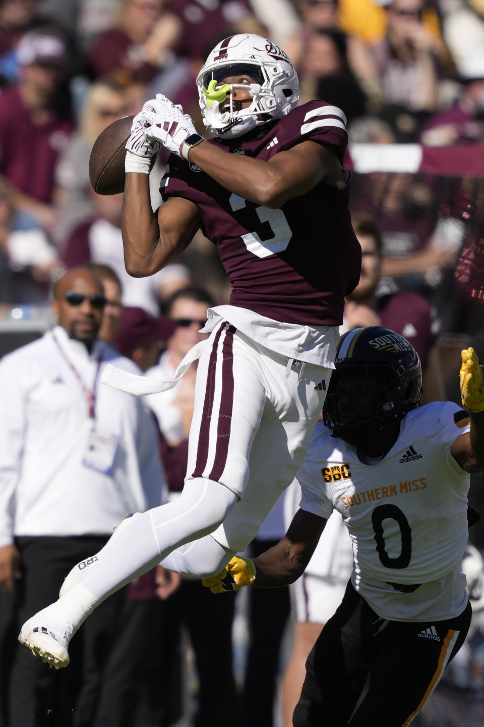 Mississippi State wide receiver Justin Robinson (3) cannot hold on to a pass as Southern Mississippi cornerback Brendan Toles (0) defends during the first half of an NCAA college football game in Starkville, Miss., Saturday, Nov. 18, 2023. (AP Photo/Rogelio V. Solis)