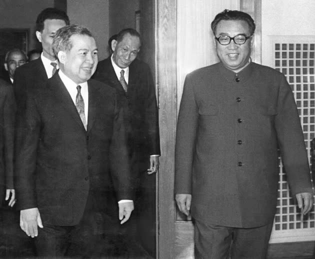 Norodom Sihanouk, former King of Cambodia, is welcomed on April 22, 1975, in Pyongyang by North Korean President Kim Il Sung. (AFP/Getty Images)