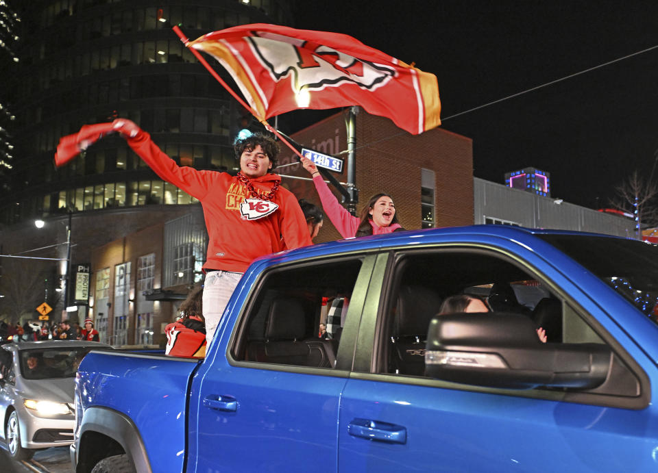 Kansas City Chiefs fans celebrate after the Chiefs beat the San Francisco 49ers in the Super Bowl, at the Power and Light District, Sunday, Feb. 11, 2024, in Kansas City, Mo. (AP Photo/Peter Aiken)