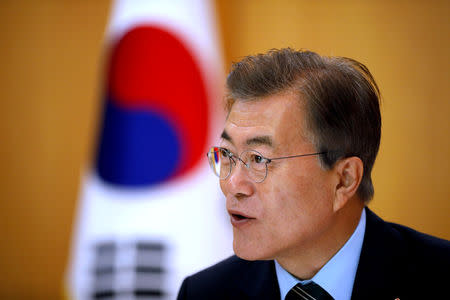 FILE PHOTO: South Korean President Moon Jae-in speaks during an interview with Reuters at the Presidential Blue House in Seoul, South Korea June 22, 2017. REUTERS/Kim Hong-Ji/File Photo