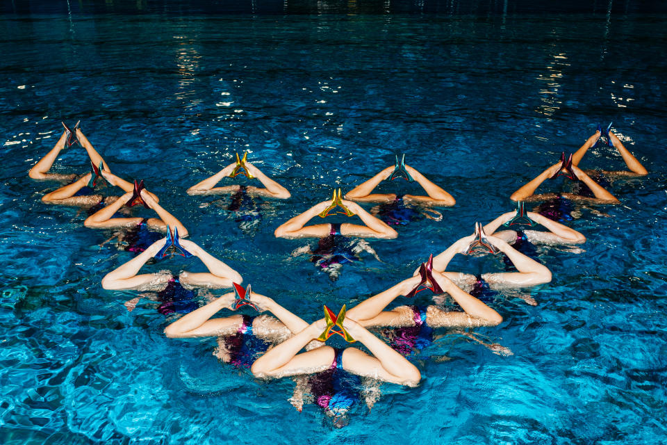 Artistic swimmers from France’s national team rehearsing for Christian Louboutin’s presentation.