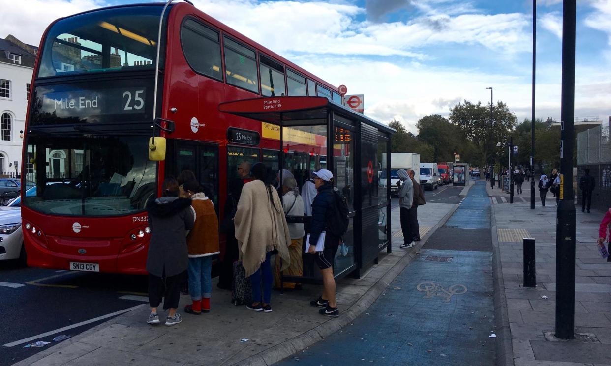 <span>A floating bus stop on the CS2 cycle route in Mile End, east London: passengers need to cross the bike lane when getting on or off the bus. </span><span>Photograph: Dave Hill/The Guardian</span>