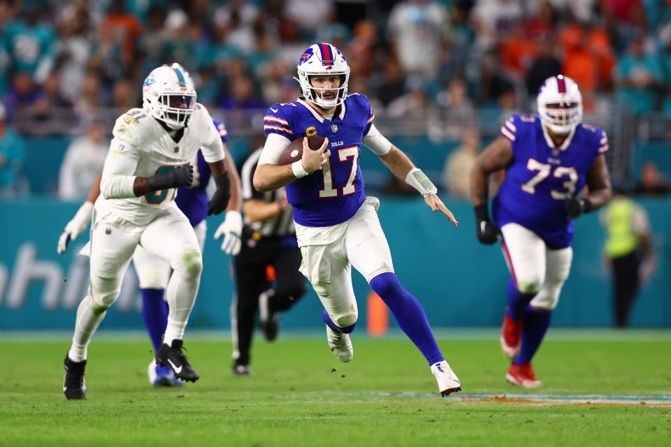 MIAMI GARDENS, FLORIDA - JANUARY 07: Josh Allen #17 of the Buffalo Bills rushes during the second quarter against the Miami Dolphins at Hard Rock Stadium on January 07, 2024 in Miami Gardens, Florida. (Photo by Megan Briggs/Getty Images)