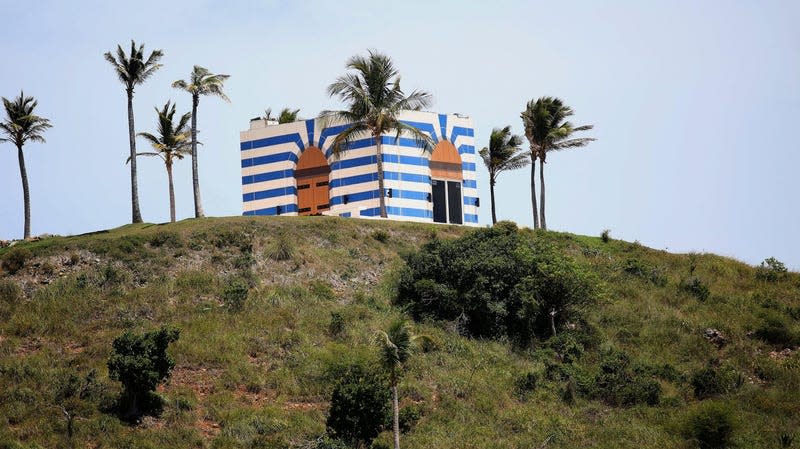 A blue-striped structure sits on a lookout point on Little St. James Island, in the U. S. Virgin Islands, a property owned by Jeffrey Epstein, Wednesday, Aug. 14, 2019. - Photo: Gabriel Lopez Albarran (AP)