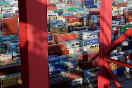 Containers are seen at the Yangshan Deep Water Port, part of the Shanghai Free Trade Zone, in Shanghai, China, September 24, 2016. REUTERS/Aly Song/File Photo