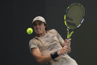 Adam Walton, of Australia, watches an incoming ball in his men's first round match against Felix Auger-Aliassime, of Canada, at the Miami Open tennis tournament, Thursday, March 21, 2024, in Miami Gardens, Fla. (AP Photo/Rebecca Blackwell)