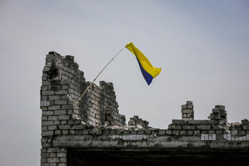 A Ukrainian national flag is seen, amid Russia's attack on Ukraine, near the front line in the newly liberated village Neskuchne in Donetsk region (REUTERS)