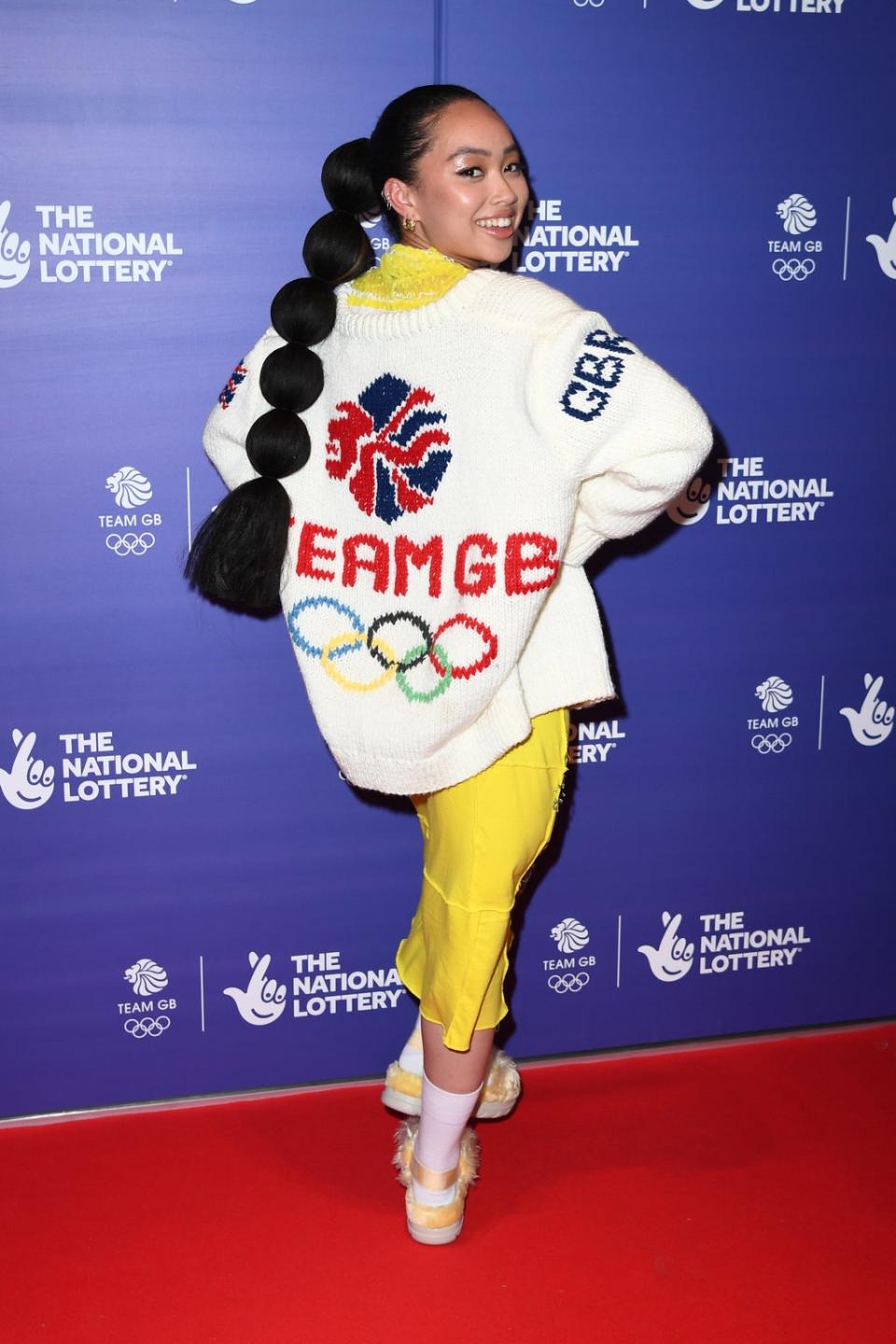 Griff wears Tom Daley’s Olympic Cardigan to perform at the Team GB homecoming (Getty Images for The National Lo)